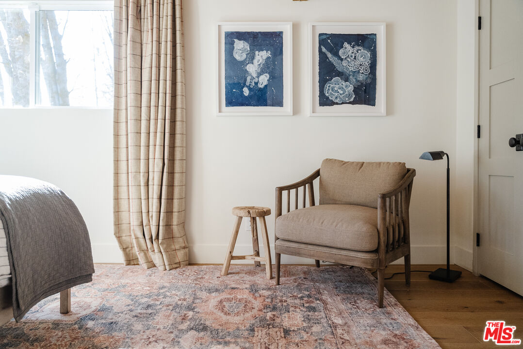28805 North Shore Road Lake Arrowhead, CA 92352 - Photo 14 of 40 a living room with furniture and a window