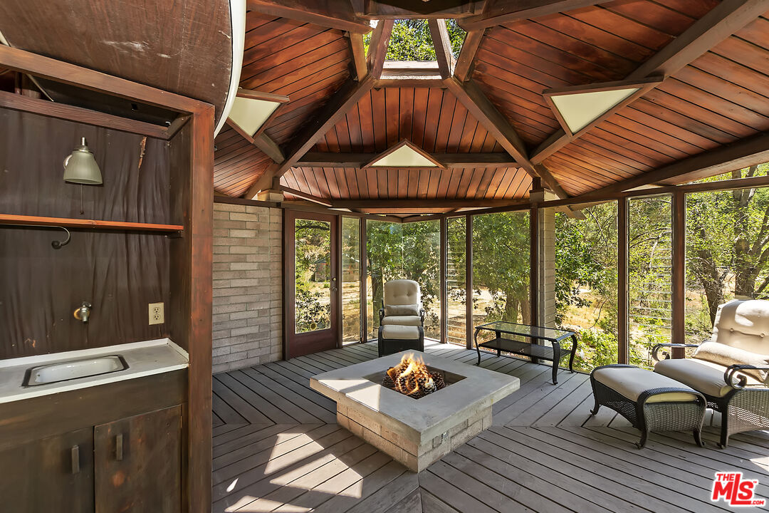 28805 North Shore Road Lake Arrowhead, CA 92352 - Photo 34 of 40 a work room with furniture and large windows