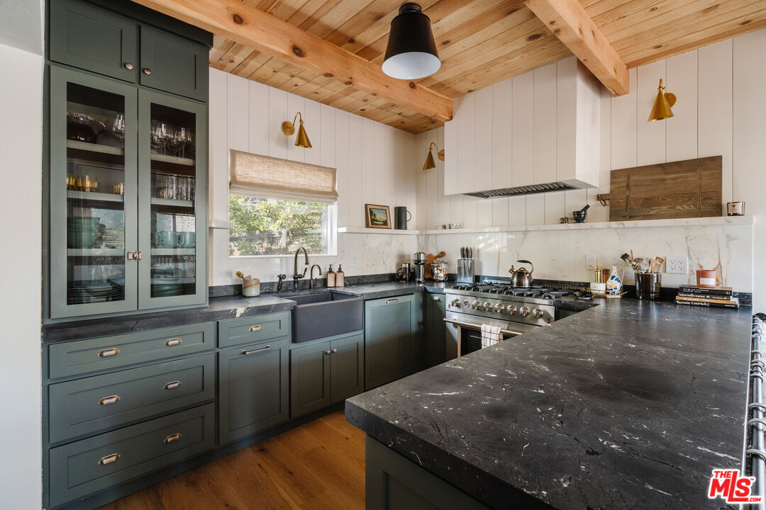 28805 North Shore Road Lake Arrowhead, CA 92352 - Photo 10 of 40 a kitchen with sink cabinets and window