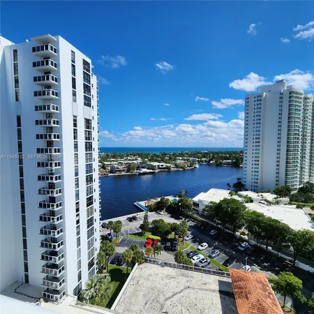 a view of a city with tall buildings