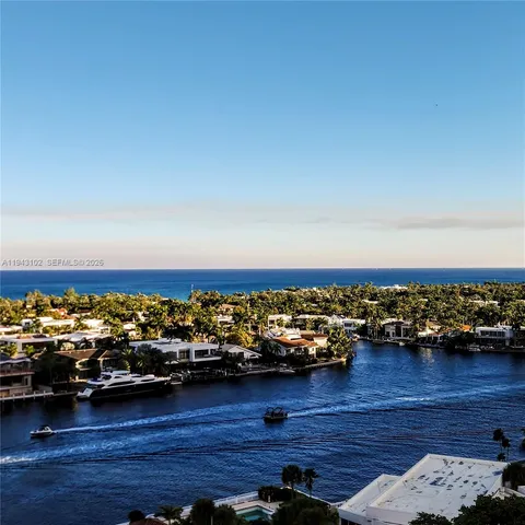 a view of a ocean with boats