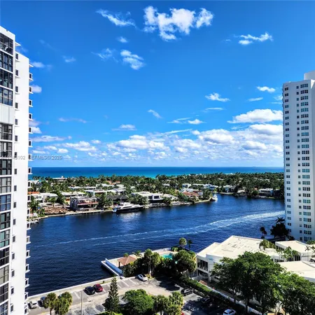 a view of a lake with a city view