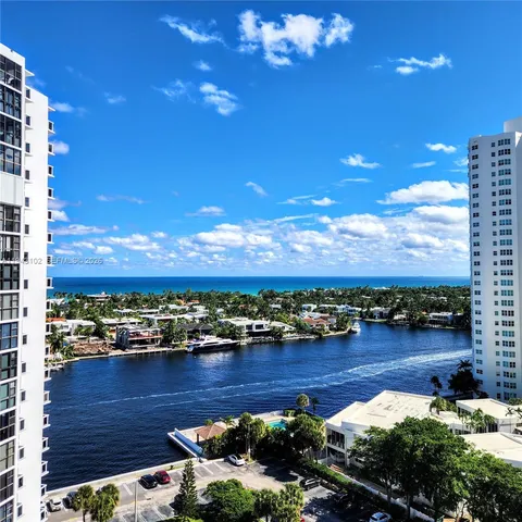 a view of a lake with a city view