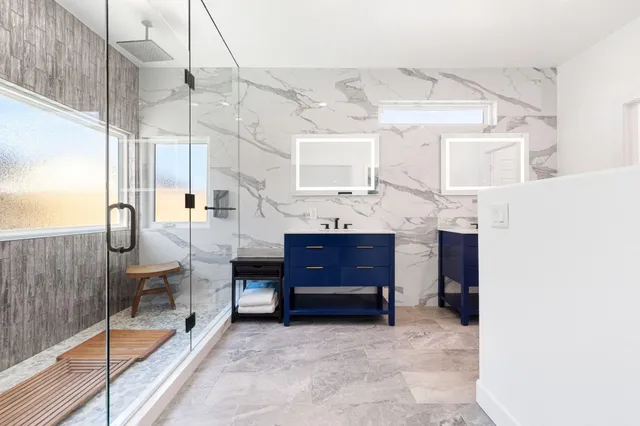 a view of living room kitchen and entryway