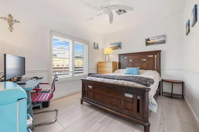 a bathroom with a sink toilet and mirror