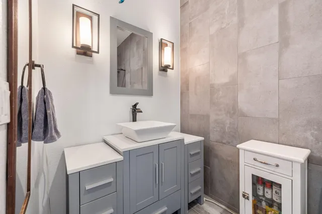 a bathroom with a toilet and shower