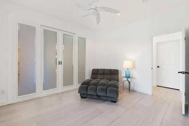 a living room with furniture and a window