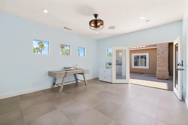 a view of kitchen and windows