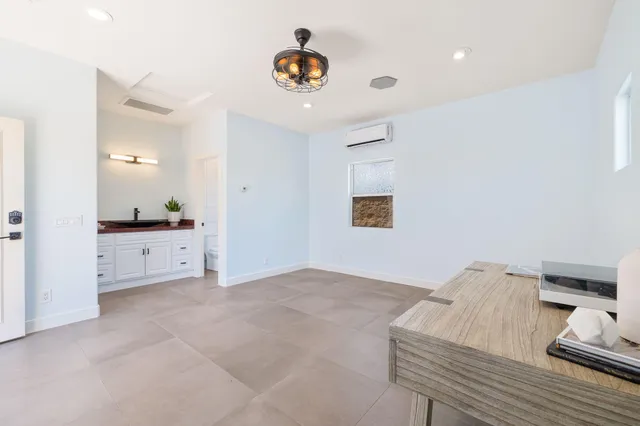a room with cabinets and window