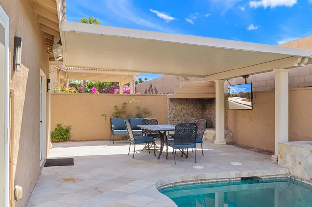 a view of a house with a patio