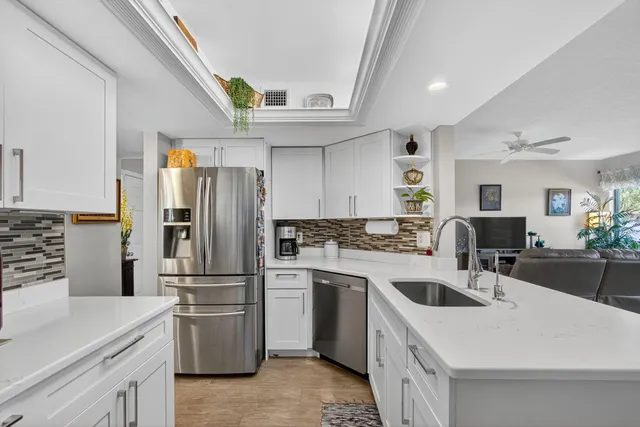 a view of a patio with a yard