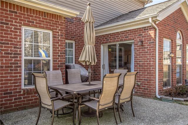 3003 Hope Circle Spring Hill, TN 37174 - Photo 16 of 20 15x14 back aggregate PATIO overlooks LARGE FLAT BACK YARD that backs to TREES.