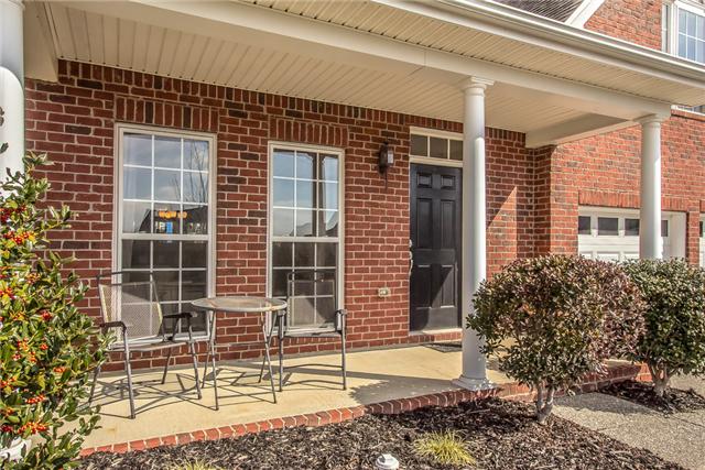 3003 Hope Circle Spring Hill, TN 37174 - Photo 3 of 20 Covered "rocking chair" front porch overlooks the quiet culdesac.