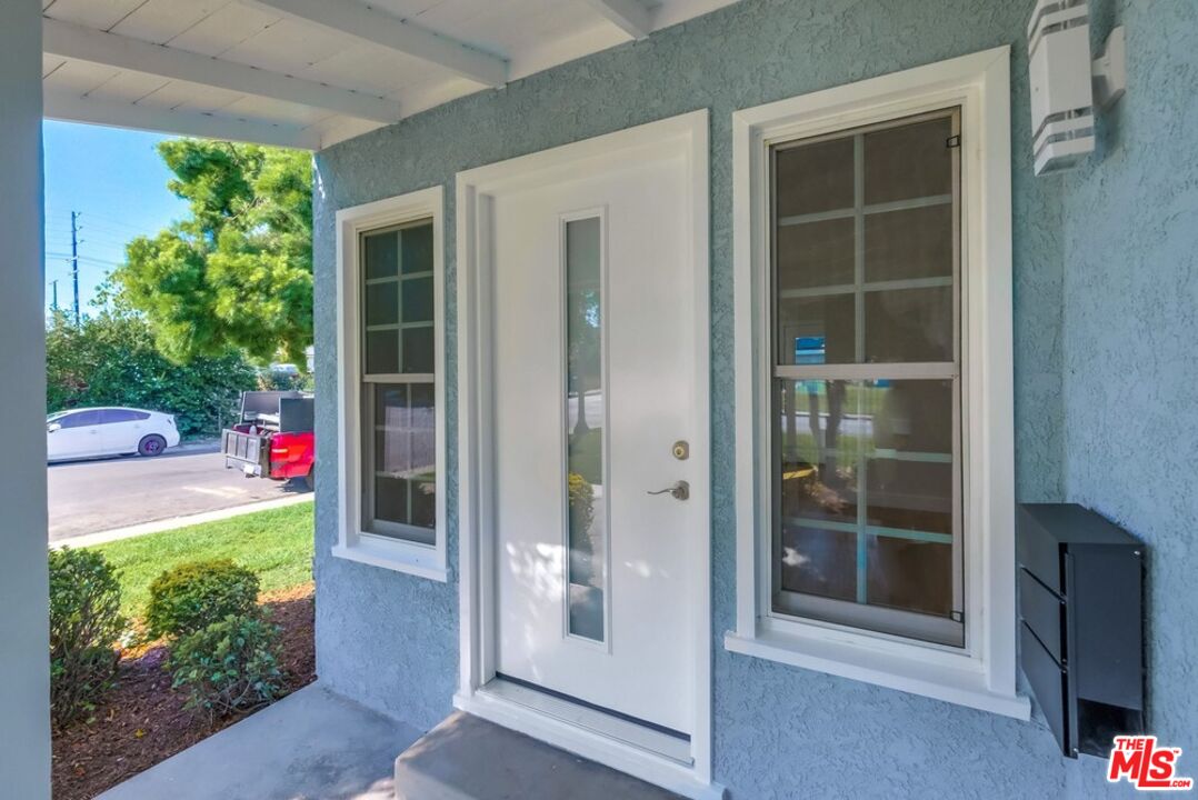 8356 Kittyhawk Avenue Los Angeles, CA 90045 - Photo 2 of 24 a view of outdoor space and front view of a house