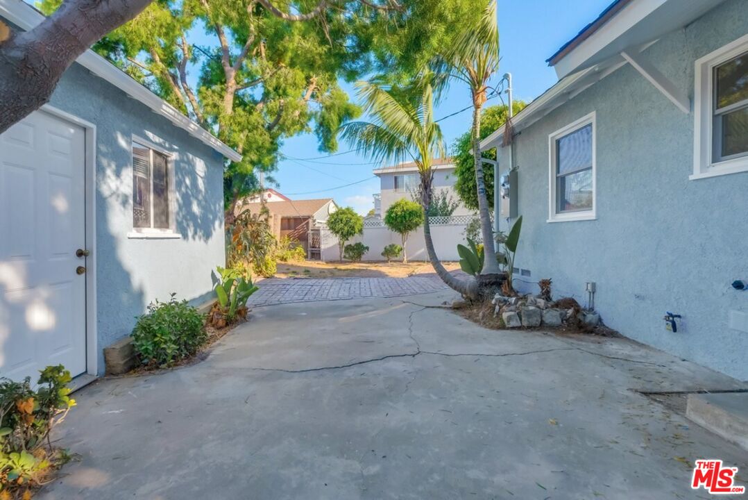 8356 Kittyhawk Avenue Los Angeles, CA 90045 - Photo 24 of 24 a view of a house with a yard and tree s