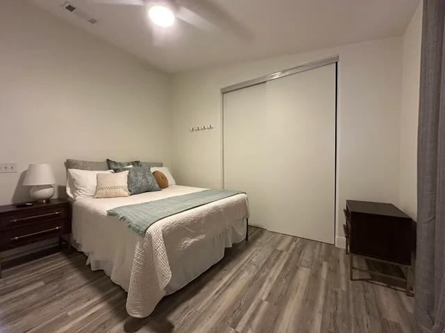 a room with a bed and a table