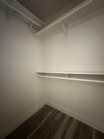 a view of an empty walk in closet