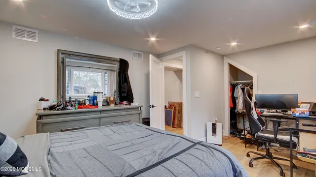 a bathroom with a toilet sink and shower