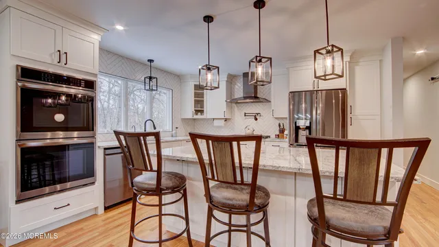 a view of a backyard with large trees