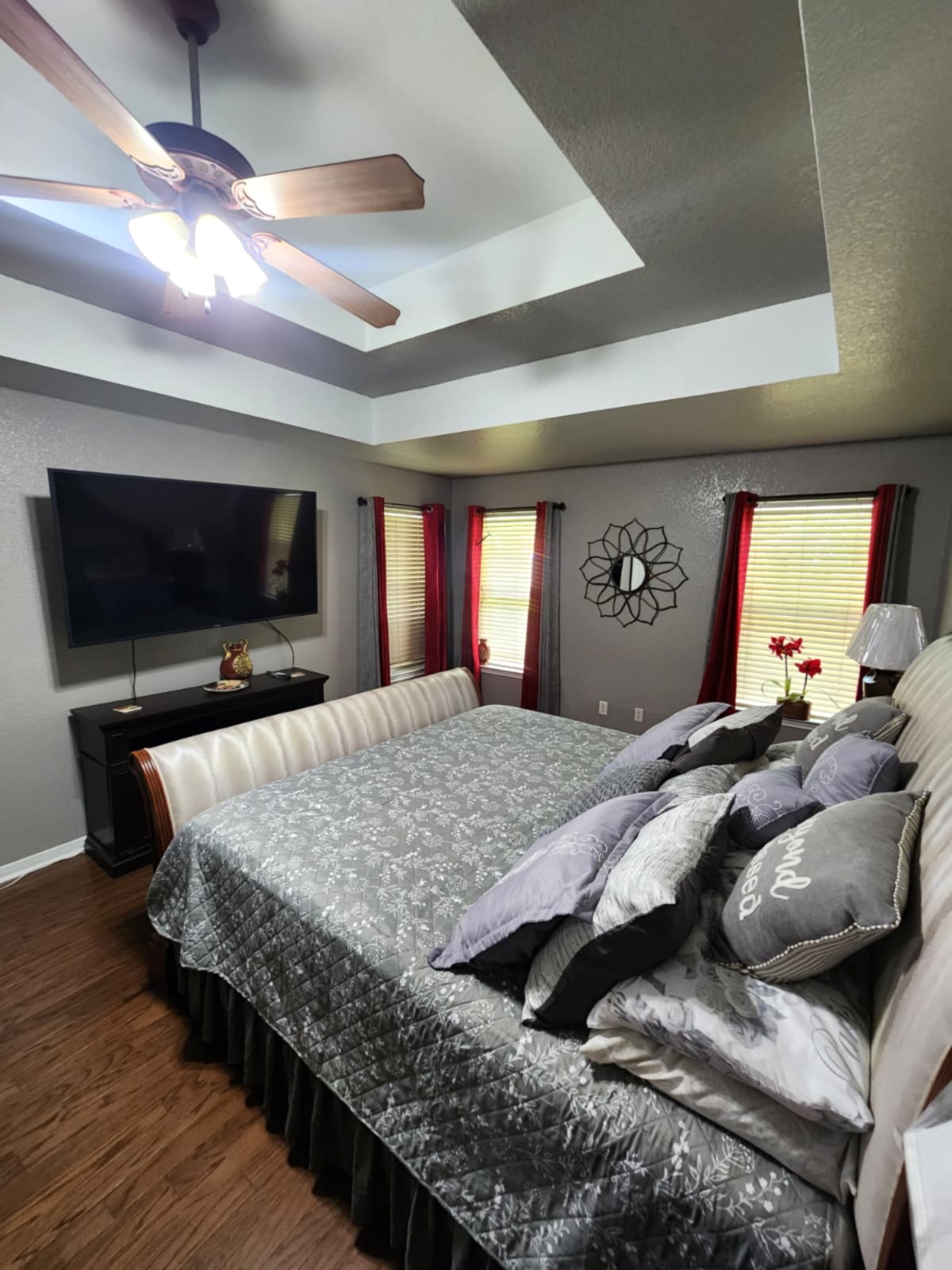 5603 Hunters Ridge Trail Killeen, TX 76542 - Photo 10 of 13 Hardwood floors and tray ceilings elevate this comfortable bedroom sanctuary.