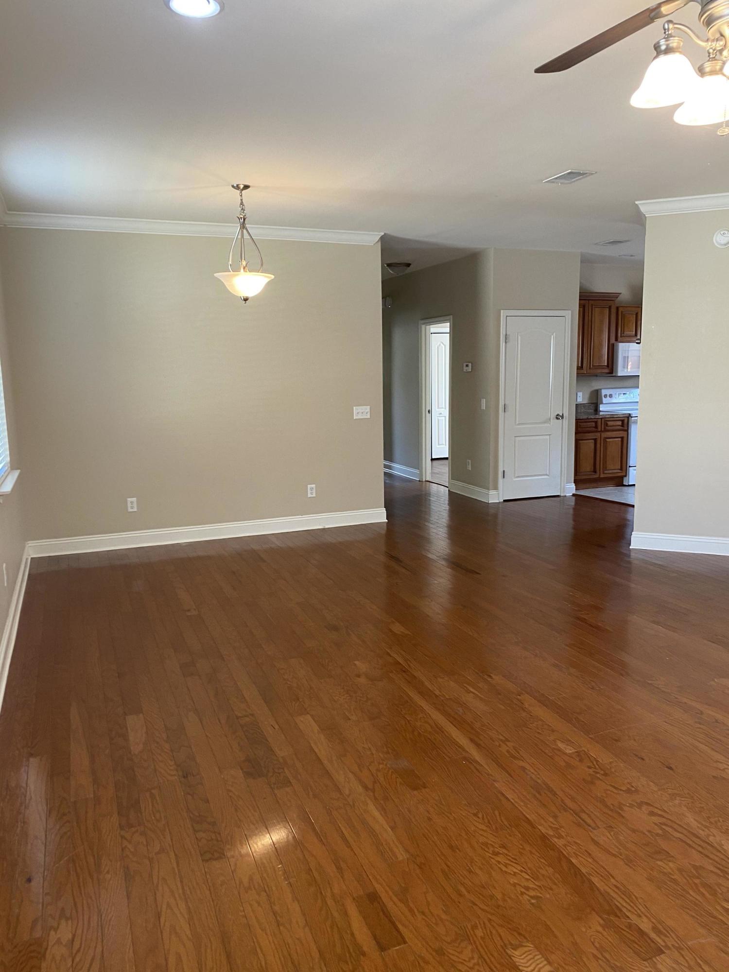 239 County Line Road Niceville, FL 32578 - Photo 8 of 36 a view of empty room with wooden floor