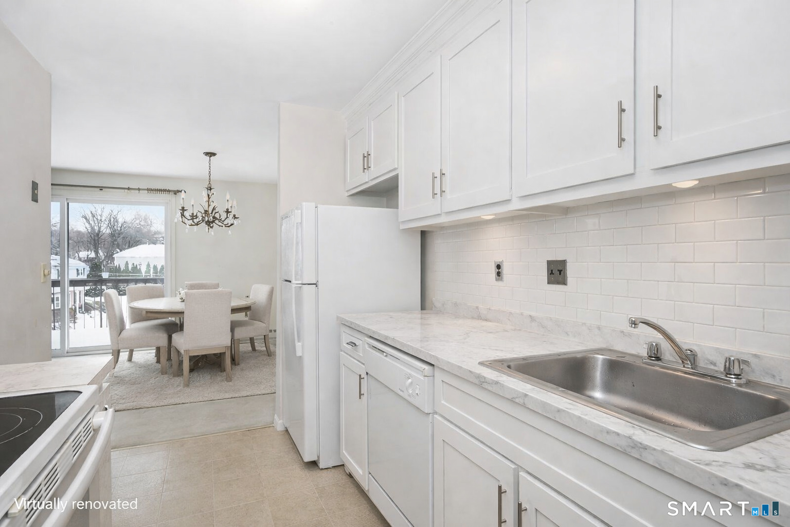 85 Riverside Avenue, Unit F7 Stamford, CT 06905 - Photo 12 of 24 a kitchen that has a sink and a stove