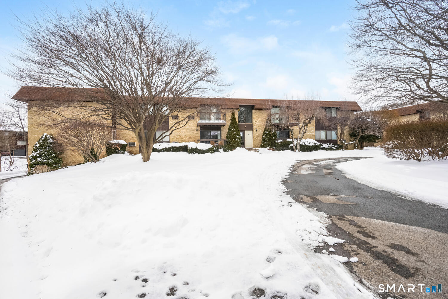 85 Riverside Avenue, Unit F7 Stamford, CT 06905 - Photo 24 of 24 a street view covered with snow