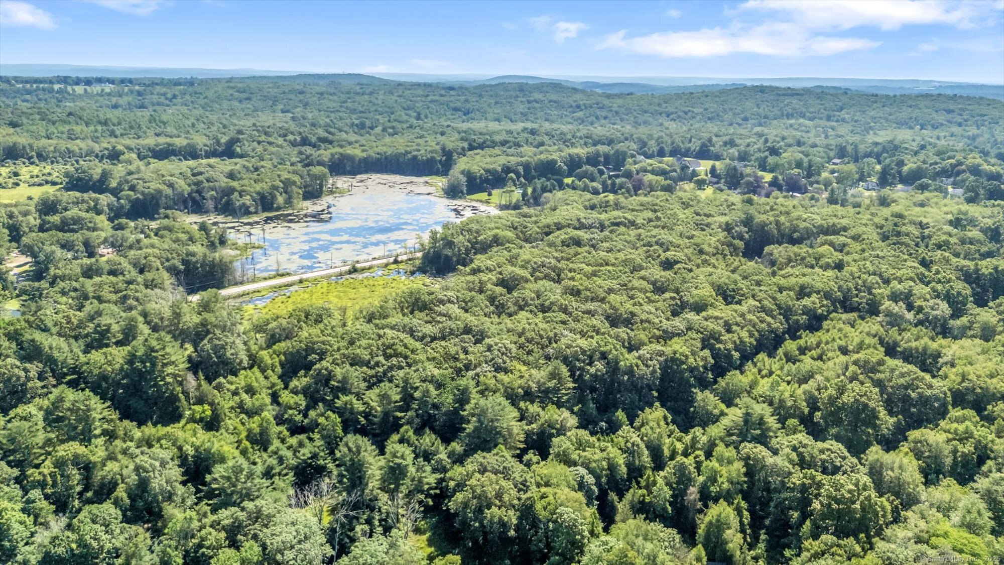 Trumbull Highway Lebanon, CT 06249 - Photo 4 of 21 an aerial view of residential houses with outdoor space and trees