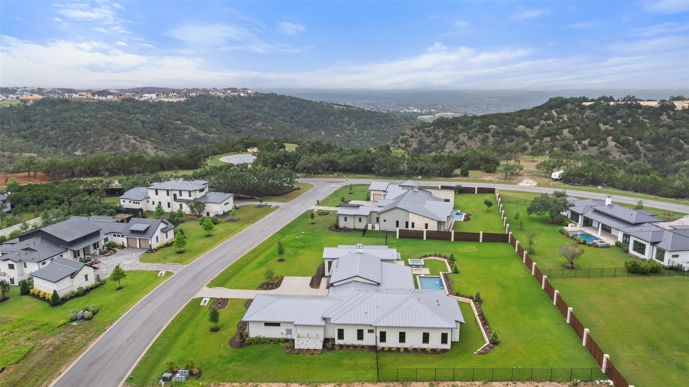 17212 Morning Grove Lane Austin, TX 78738 - Photo 37 of 38 an aerial view of a house with a garden