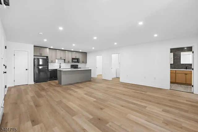 a view of kitchen with wooden floor