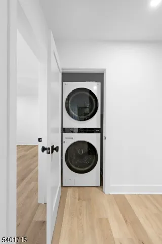 a bathroom with a toilet and a rug