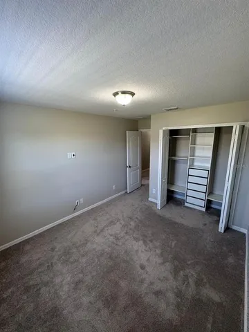 a bathroom with a tub and shower