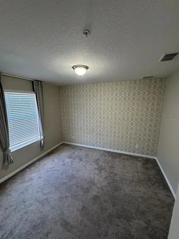 a view of a house with a patio