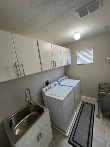 a view of storage and utility room