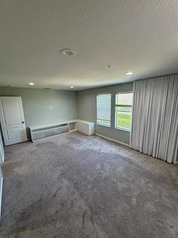 a view of a garden with a bench