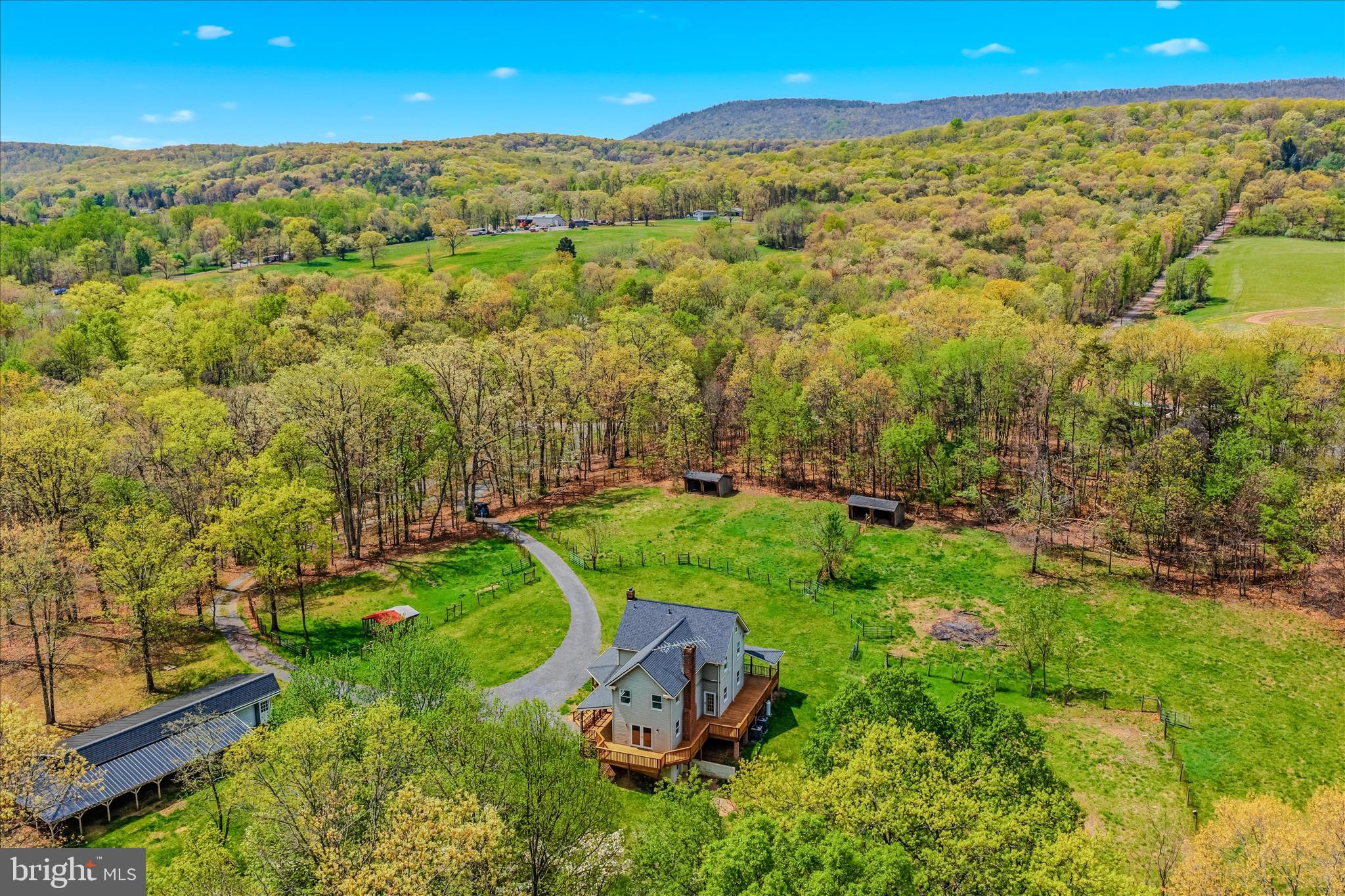 344 Tub Run Hollow Road Hedgesville, WV 25427 - Photo 24 of 85 a view of a garden with an ocean