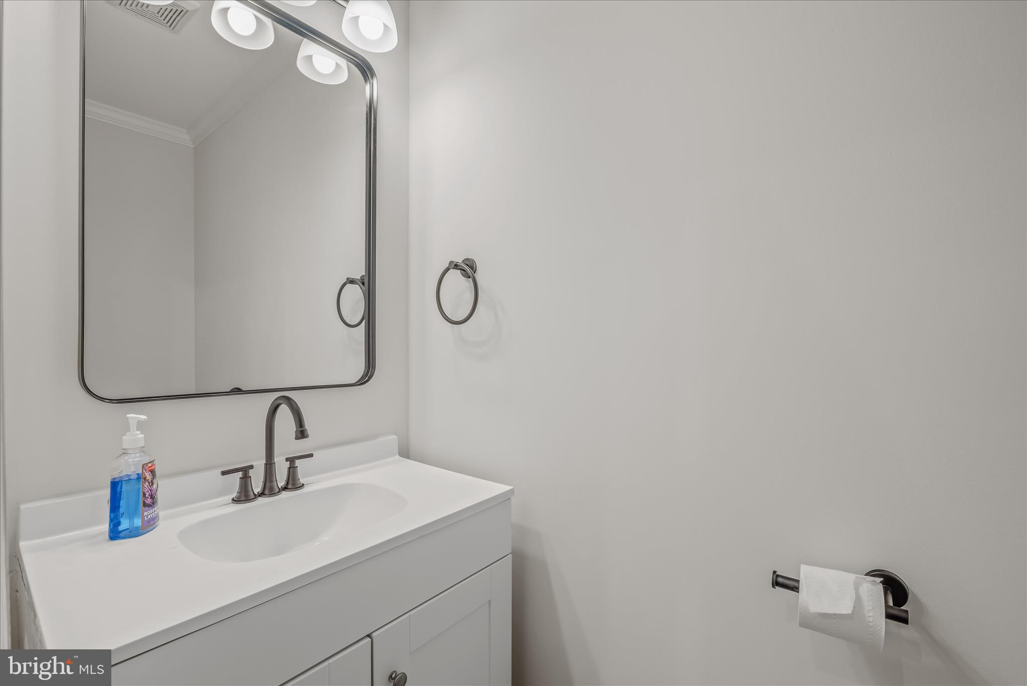 344 Tub Run Hollow Road Hedgesville, WV 25427 - Photo 48 of 85 a bathroom with a sink and mirror
