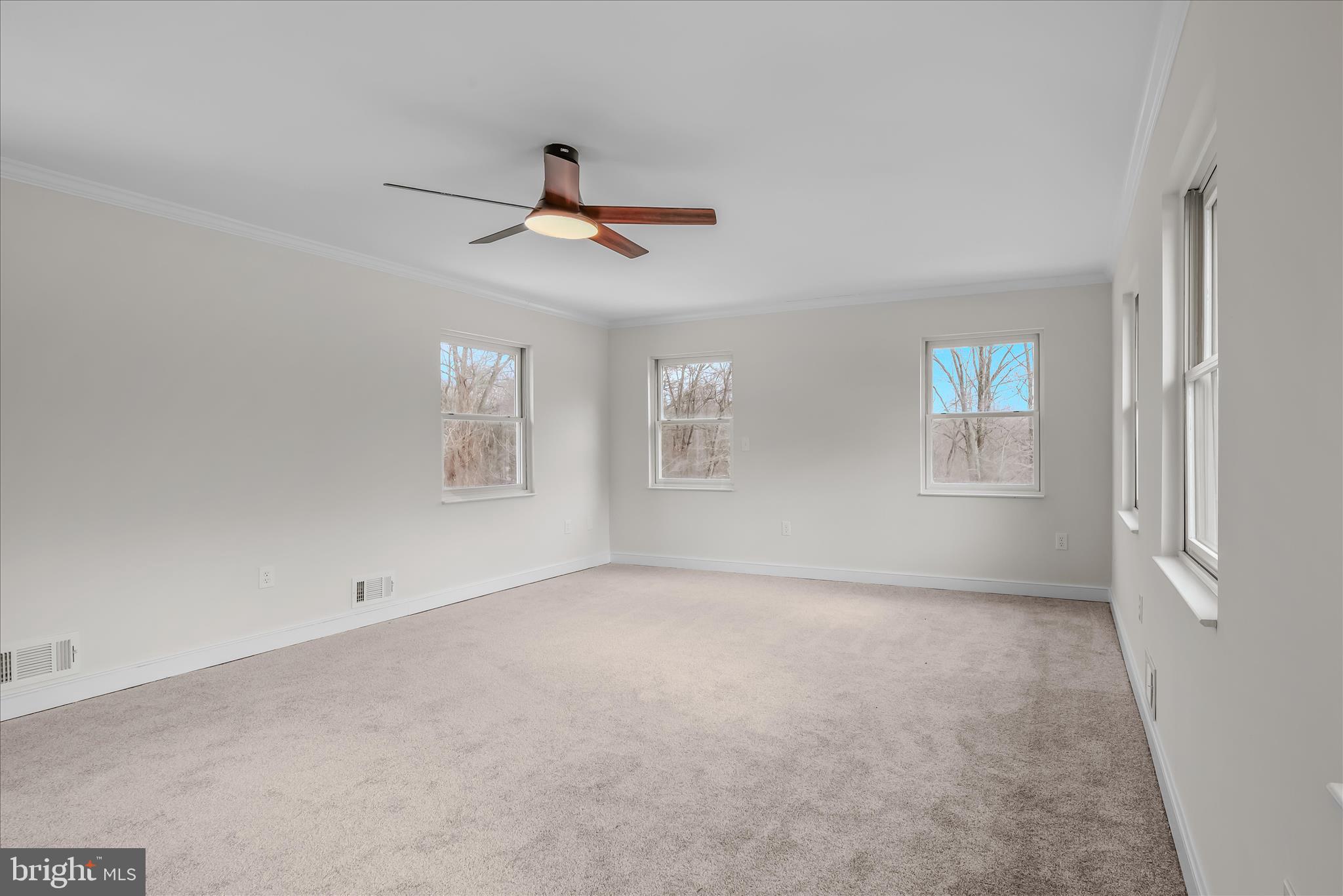 344 Tub Run Hollow Road Hedgesville, WV 25427 - Photo 49 of 85 an empty room with windows and fan