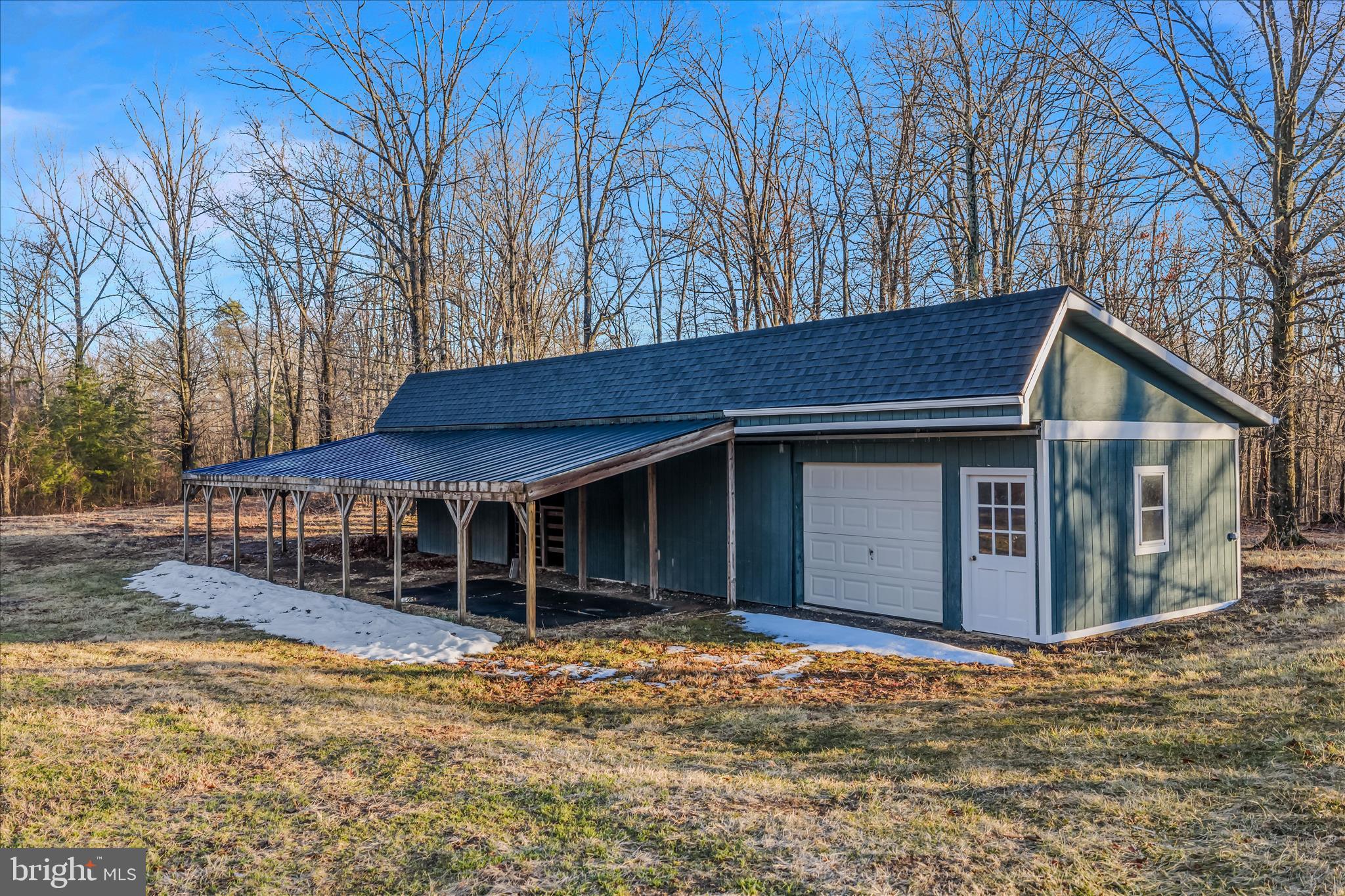 344 Tub Run Hollow Road Hedgesville, WV 25427 - Photo 69 of 85 a view of house with a yard and roof
