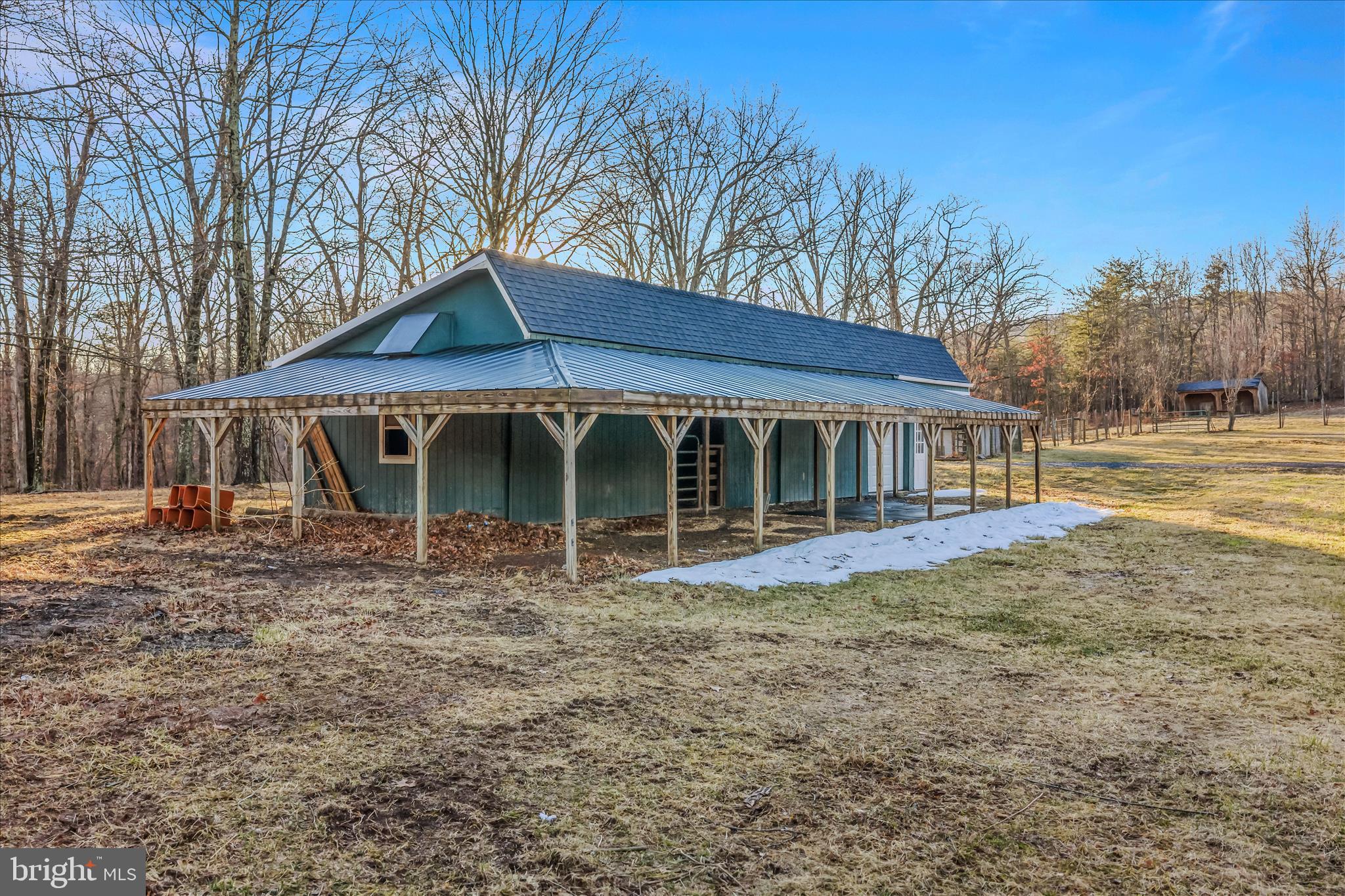344 Tub Run Hollow Road Hedgesville, WV 25427 - Photo 70 of 85 a front view of a house with garden