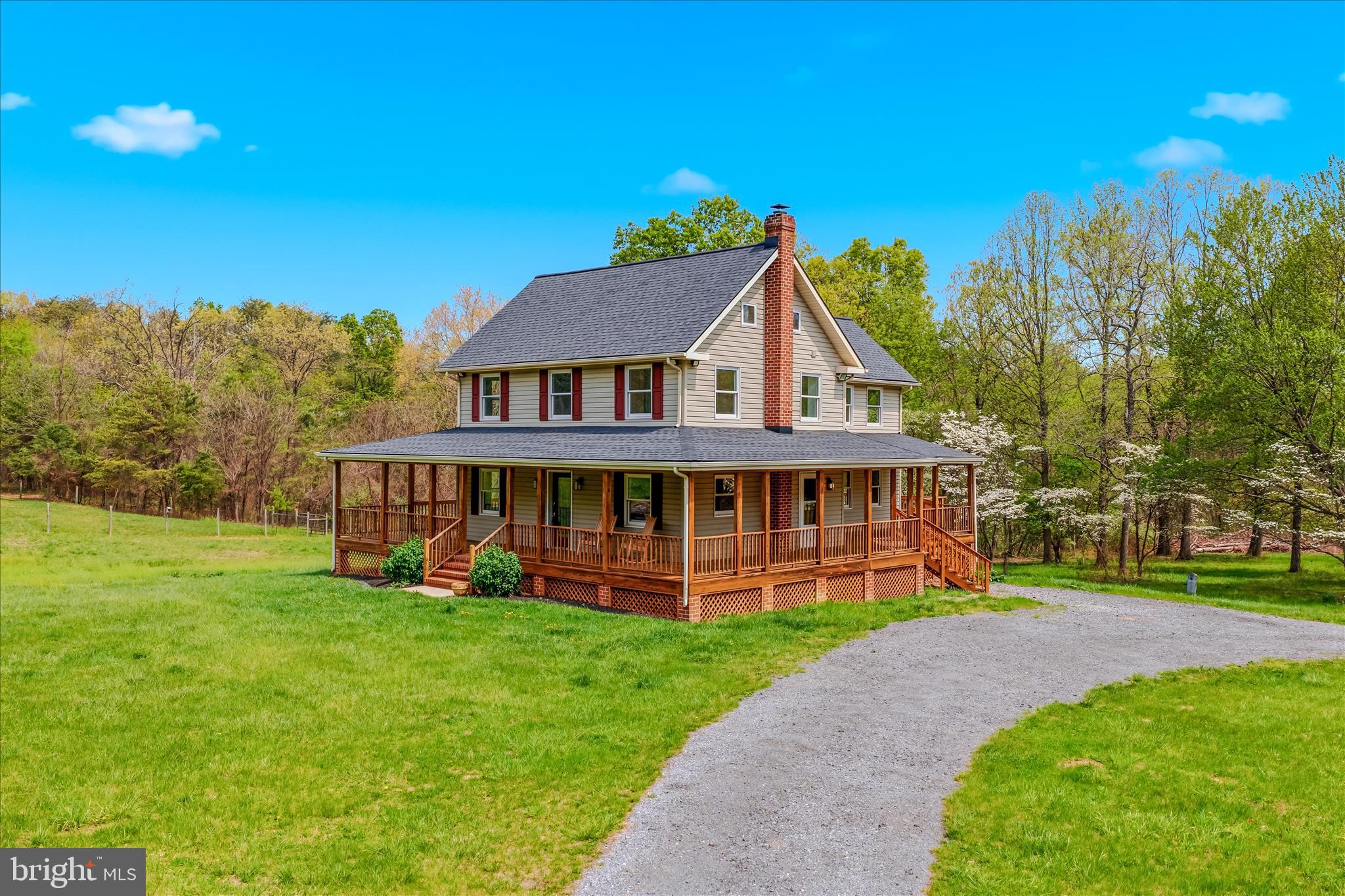 344 Tub Run Hollow Road Hedgesville, WV 25427 - Photo 7 of 85 a view of a house with a yard