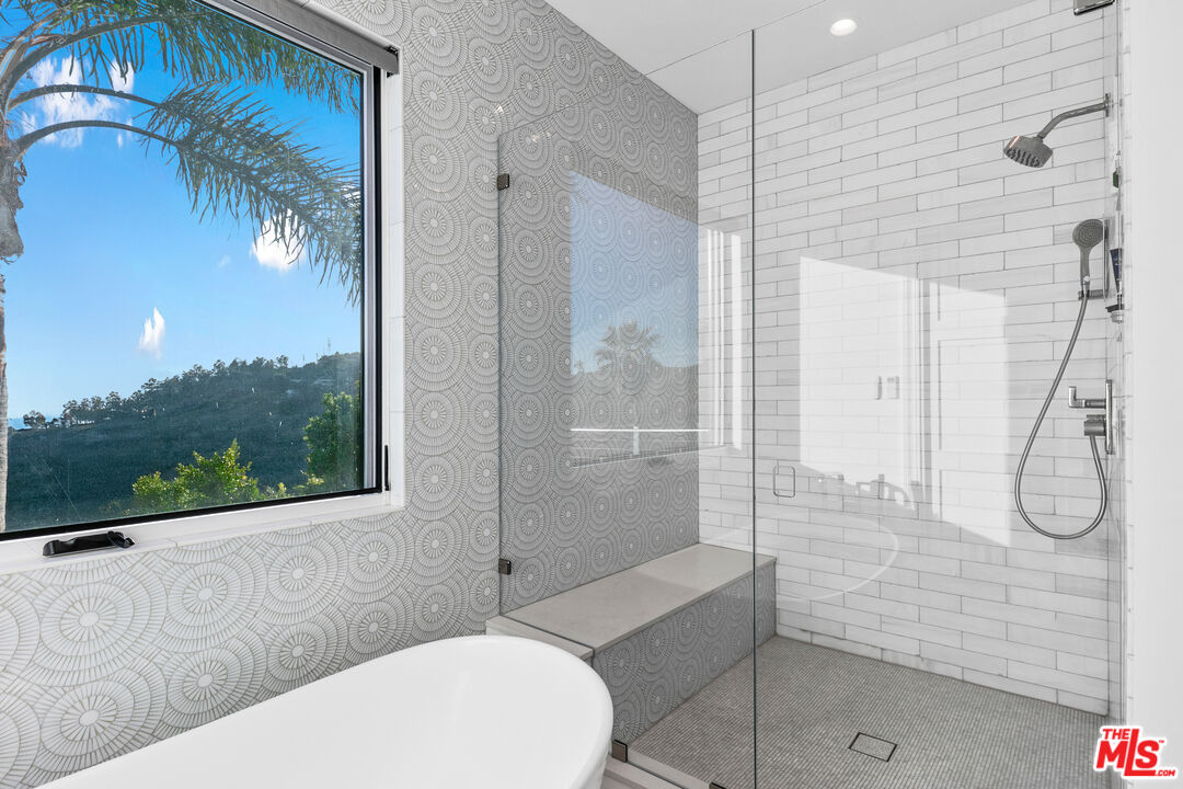 26575 Ocean View Drive Malibu, CA 90265 - Photo 19 of 40 a bathroom with a toilet and shower