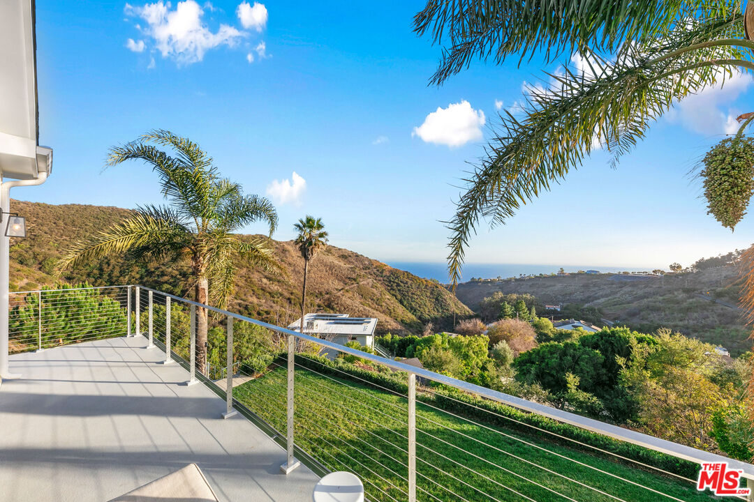 26575 Ocean View Drive Malibu, CA 90265 - Photo 23 of 40 a view of a balcony with an outdoor space