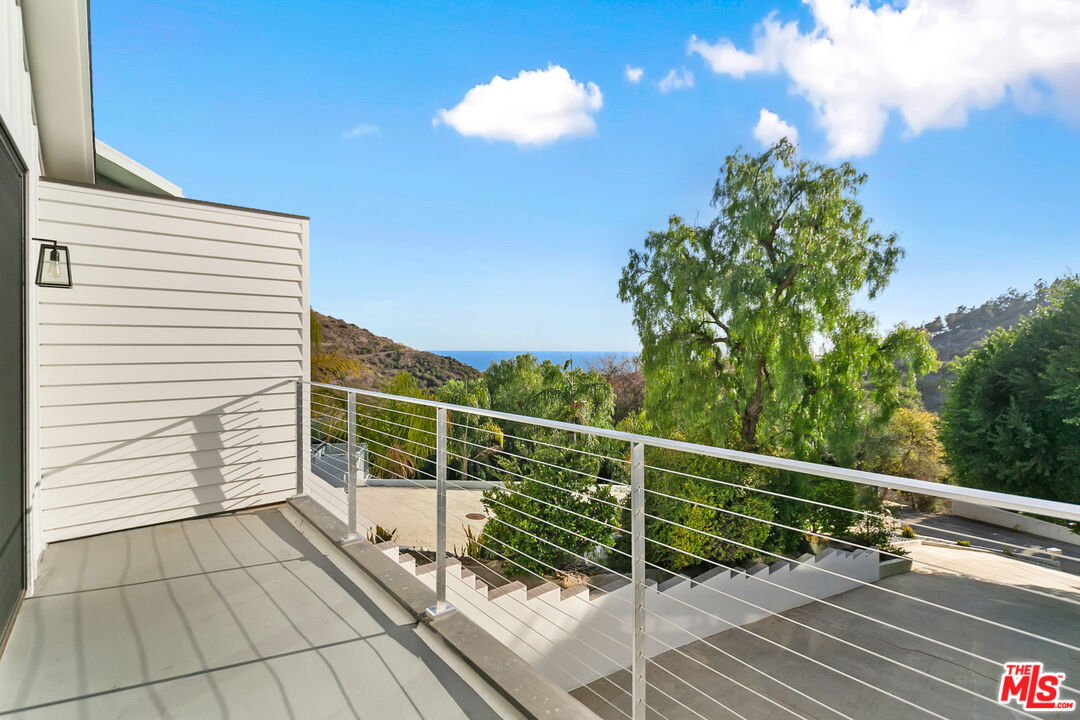 26575 Ocean View Drive Malibu, CA 90265 - Photo 35 of 40 a view of balcony with two chairs