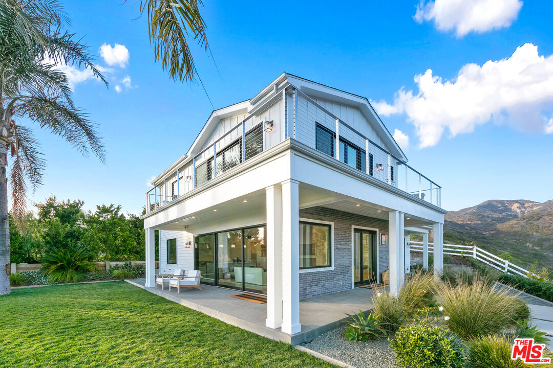 26575 Ocean View Drive Malibu, CA 90265 - Photo 37 of 40 a view of a house with a yard