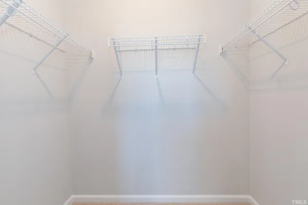 a view of a room with racks on the wall