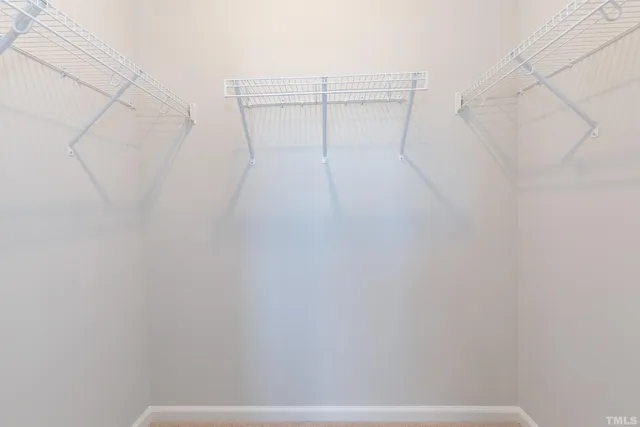 a view of a room with racks on the wall