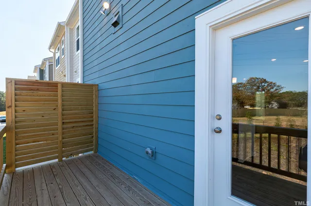 a view of outdoor space and wooden deck