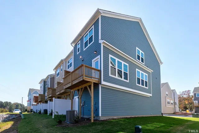 a view of a building with a yard