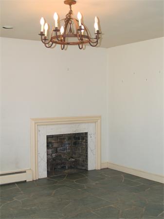 24 Conant Road Lincoln, MA 01773 - Photo 8 of 10 an empty room with a fireplace